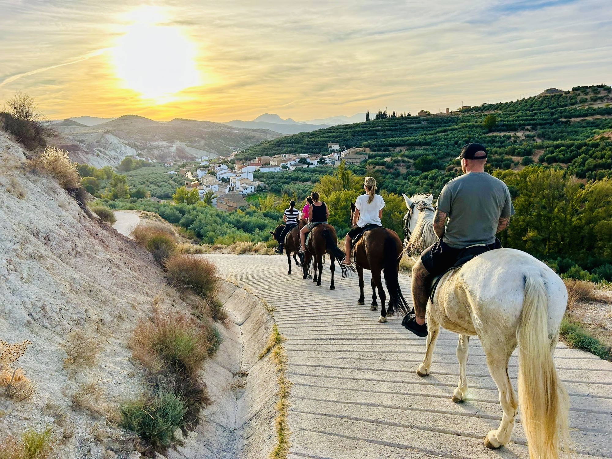 Riders toward the village